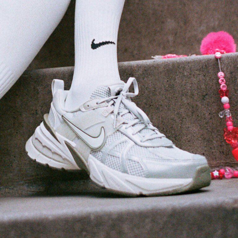 A person wearing Nike sneakers.