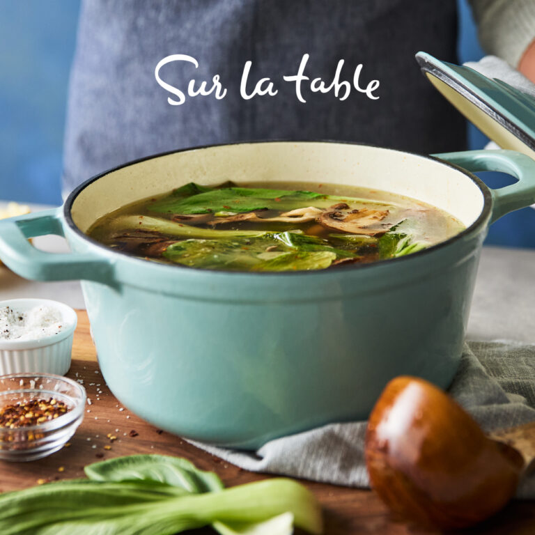 A pot of soup in Sur La Table cookware, and the superimposed text "Sur la table".